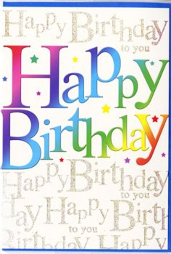 The photograph focuses on a single birthday card whose design radiates cheerful energy, as if it could easily be spotted in a Luton florist's window along Dunstable Road. Across the middle of the card, the greeting Happy Birthday is presented in big, bold letters with a slightly rounded shape that feels friendly and relaxed. Each letter sits within a gradient wash of colour, so the phrase reads like a horizontal rainbow: starting with deep red tones at one side, shifting smoothly through vivid orange and soft amber into lemon yellow, then turning to bright green, turquoise, and finally royal blue and violet. The flow of colours feels harmonious, like petals mingling in a colourful birthday bouquet. Behind this dominant text, the background is intricately yet subtly detailed. In evenly spaced horizontal bands, a delicate cursive script repeats Happy Birthday to you over and over again. The script is printed in a refined metallic gold that seems to glimmer gently, not in a flashy way but with a soft, elegant sheen, the way evening light flickers across Wardown Lake. The handwriting is small enough to act as a pattern more than a primary message, allowing the rainbow letters to remain centre stage while adding a sense of depth and luxury. The card stock itself appears to be a warm ivory or cream, giving a comforting, slightly vintage feel even though the design is fresh and contemporary. Together, the bold colour, gentle shimmer, and thoughtful composition create a card that feels perfect to accompany birthday flowers delivered to a Luton home, where it can sit proudly on a mantelpiece and brighten the room long after the candles are blown out.